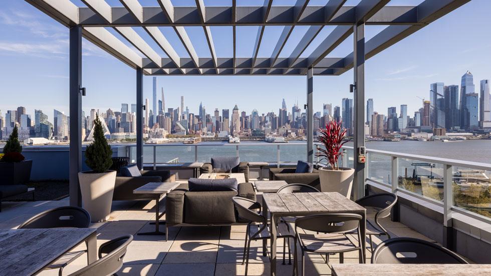 View from the resident lounge at RiverHouse 11 at Port Imperial in Weehawken, New Jersey.