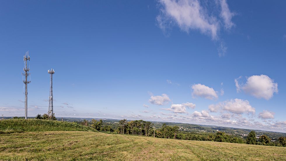 Cell phone tower in field