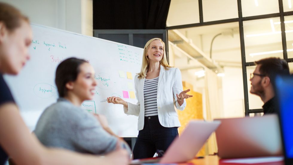 Women leading a meeting