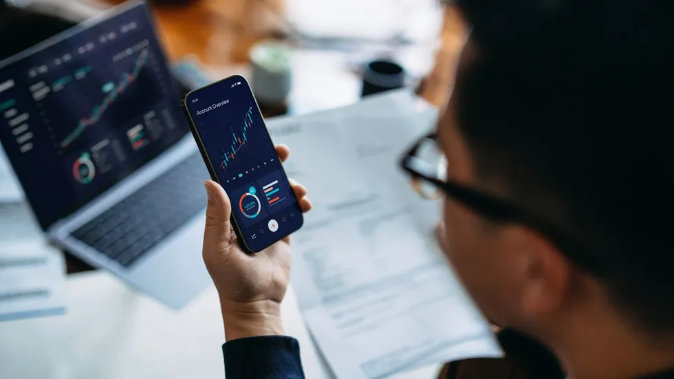 Man Checking Investment Performance