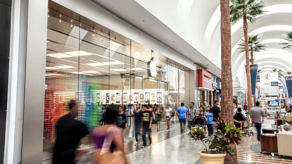 Shoppers inside a large regional mall