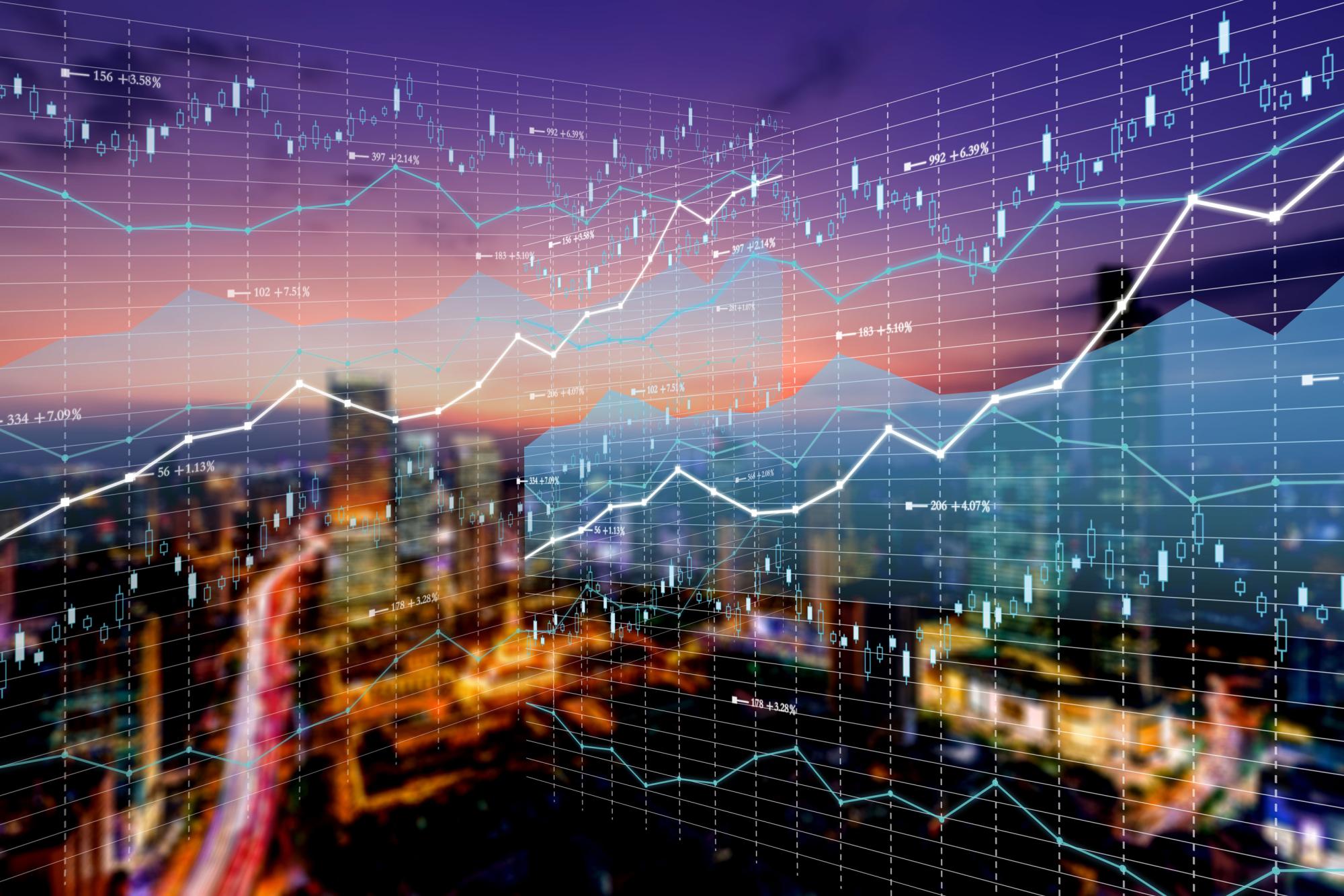Stock photo of cityscape and graphs of numbers