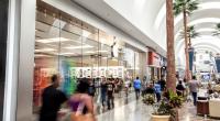 Shoppers inside a large regional mall