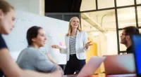 Women leading a meeting