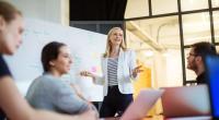 Women leading a meeting