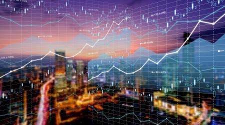 Stock photo of cityscape and graphs of numbers