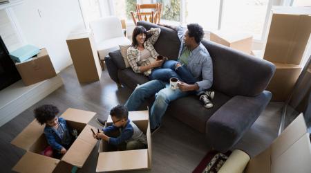 A family unpacking in a new house