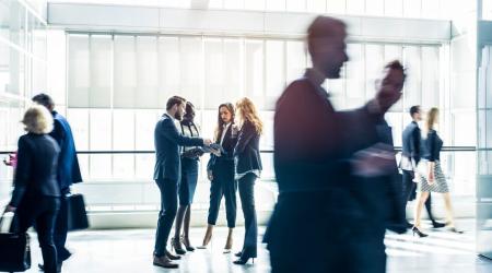 Stock photo of busy office walkway